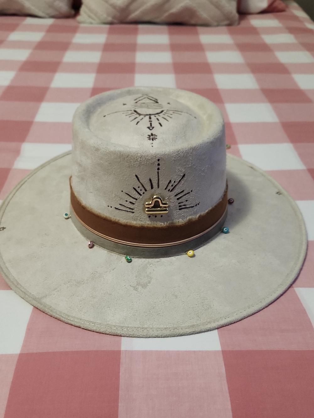 Handmade suede Cordobes hat, personalized with the Libra zodiac sign.
